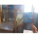 Mahogany glazed corner cupboard