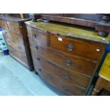 Mahogany bow front chest of 2 short above 3 long drawers with brass pulls on bracket supports AF