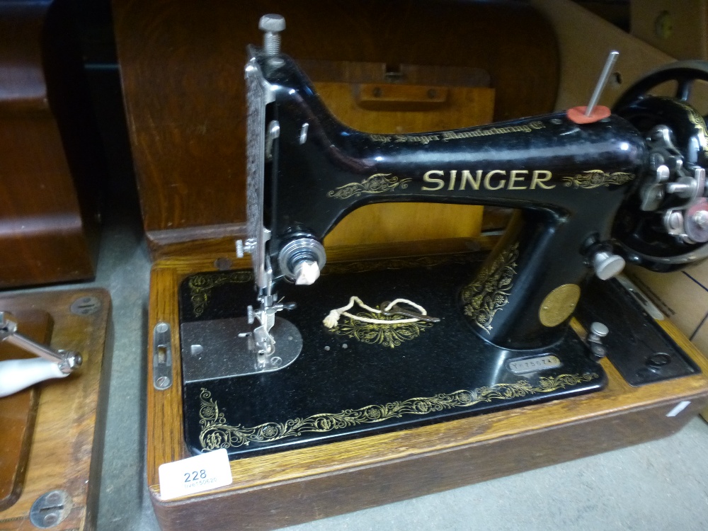 Old cased Singer sewing machine Y8756749 together with a Vesta example