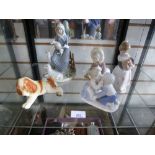 Lladro model of an Eskimo baby with a polar bear cub, lladro model of a girl and other Continental