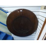 A mahogany circular table top, the centre having carving of Footballer Duggie Reid, Pompey -