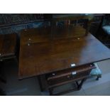 Antique oak plank top drop flap dining table