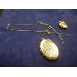 9ct yellow gold oval locket marked 375, heart shaped ex marked 9ct gold chain etc - total weight