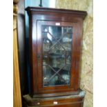 Victorian mahogany hanging corner cupboard with glazed doors.