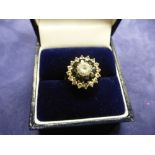 9ct yellow gold cluster dress ring set with blue and clear stones, marked 375, size O, total item