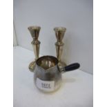 A silver GEORGE JENSON cream jug, approx 3.13 oz, and a pair of silver hallmarked candle sticks -