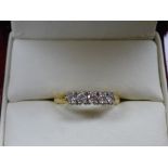 18k Gold ring set with 5 brilliant cut diamonds .50ct set in white gold in Parkhouse and Wyatt box