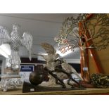 A small selection of metal figures, to include an Eagle on a ball, birds on a branch and a tree of