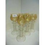 A set of six German Roemer Hock glasses having clear stems with amber bowls