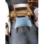 Old elm style armchair together with Victorian tub chair upholstered in striped fabric