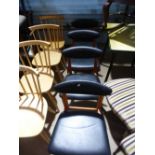 Set of four teak framed black faux leather seat and back dining chairs by Schreiber and retro
