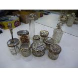 Ten silver and glass dressing table jars and bottles, all hallmarked, and of decorative design,