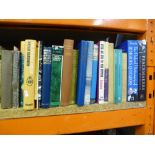 A shelf of mixed genre hardback books to include poetry, folio, etc