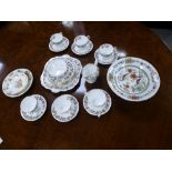 An Aynsley April Rose design tea set comprising six tea cups and saucers, cake plates, sugar bowl,