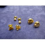 Three pairs of 9ct yellow gold earrings, marked 375, total weight approx 3.3g