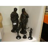 Two large metal figures depicting Greek Godesses, along with three further vintage bronze versions