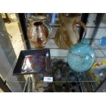 Two pottery jugs, dish and a lidded pot