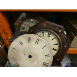 One box containing two clocks, one with its box plus a wood clock face and set of hands