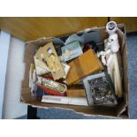 Box of collectables including Armond Marseilles bisque headed doll, oriental silks of figures,