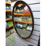 Oval shaped bevelled mirror