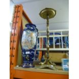 An oriental decorated blue vase, along with an ashtray made of brass on a turned wood support with