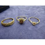 Three 9ct yellow gold dress rings - all marked 375 - total item weight approx 5.7g