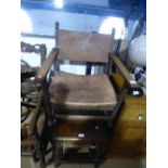 Old Oak armchair with studded brown leather seat and back