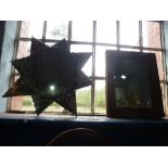 A gold wood framed bevelled mirror along with a star shape mirror