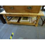 Large rectangular stripped pine coffee table with undertier