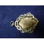 Silver medallion by FATTORINI with possibly gold initialled plaque