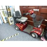 Red mobility scooter and charger, etc