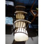 Set of four beech spindle back dining chairs