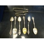 A set of six very decorative white metal spoons Continental with marks to the bowls 2.84 oz. A white