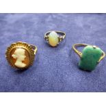 Two 9ct rose gold rings, one set with green coloured stone, gross approx 6.7g, and an opal ring on a