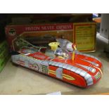 Two boxed 1960's tin trains and tin space car