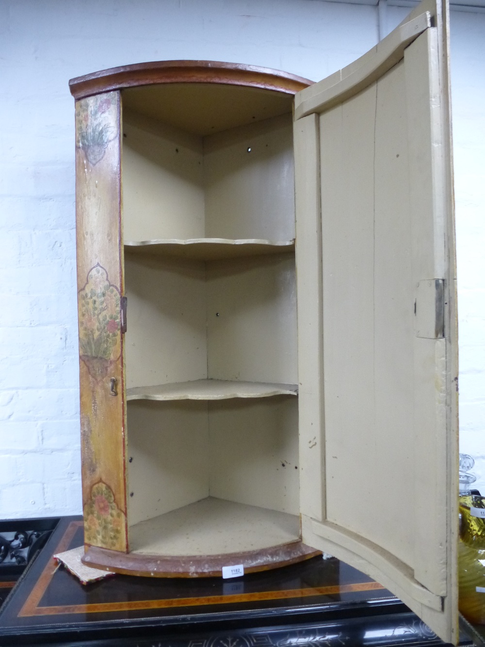 A late 18/ early 19th Century painted bow fronted corner cupboard probably Dutch, showing its - Image 2 of 2