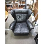 1970's black leather lounge wingback armchair