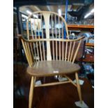 Light elm Ercol style hoop and stick back armchair