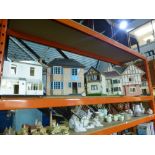 6 dolls houses all of varying styles and sizes