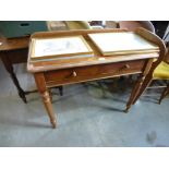 Mahogany side table with galleried back above 2 drawers on turned supports