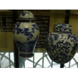 A collection of Oriental china including two blue and white ginger jars one previously converted