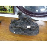 A cast metal 'possibly bronze' sculpture of two gun dogs disturbing a pheasant plus one other.