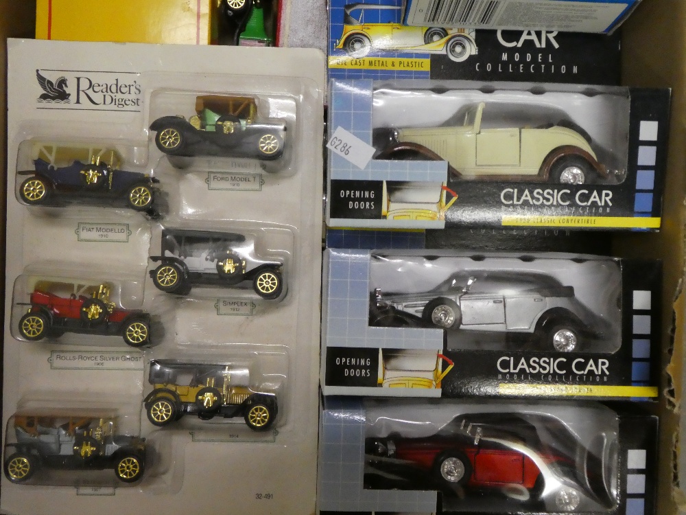 A small box of boxed, carded and loose model cars to include Matchbox, Days Gone, classic car