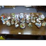 A large collection of china Beatrix Potter characters to include Royal Albert, Border Fine Art,