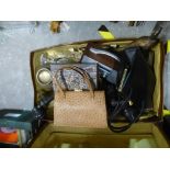 A suitcase of mixed sundry including bedwarming pan, carriage clock, DAB radio, glasses, etc