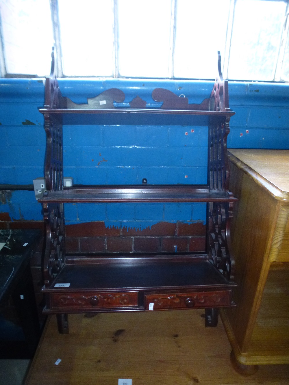 Victorian style mahogany hanging wall shelves and two base drawers