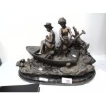 A bronze sculpture of a boy and girl in a fishing boat, of recent manufacture