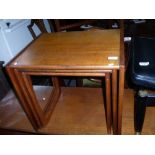 Nest of 3 mid century teak coffee table and retro black leather stool
