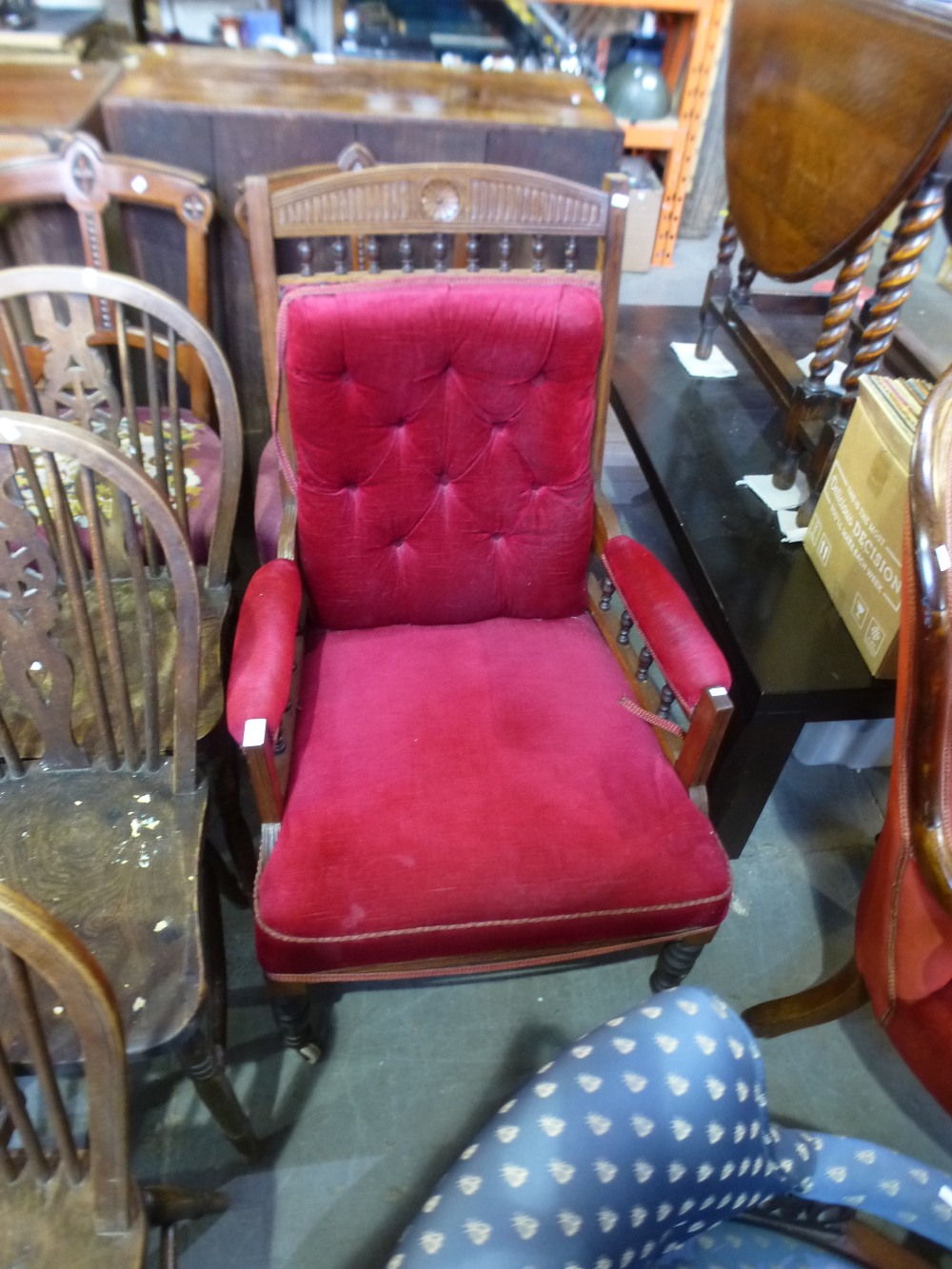 Victorian mahogany armchair upholstered in red velvet