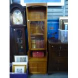 1970's teak display cabinet with glazed top above cupboard by Nathan